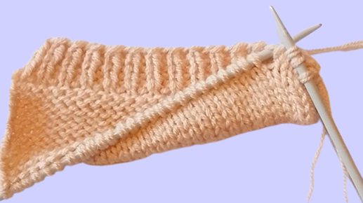 Knitted hem formed by picking up stitches from the cast on edge instead of sewing.