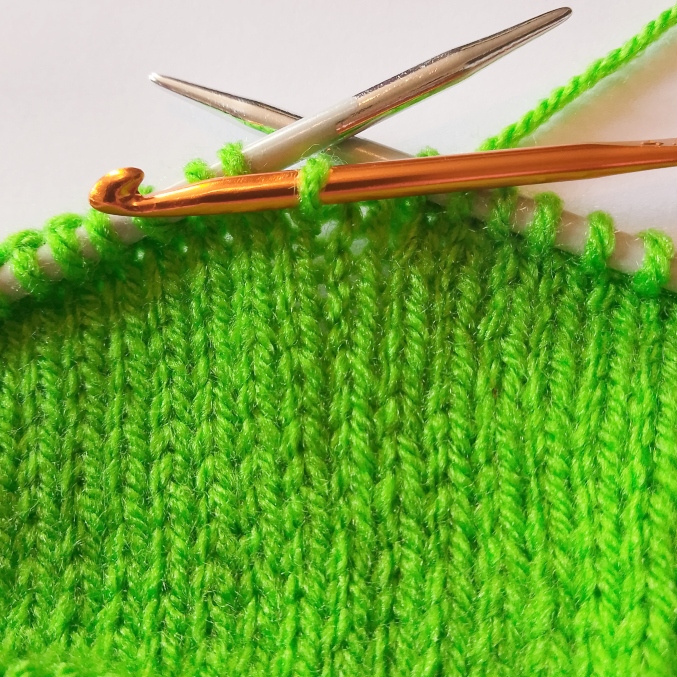 The dropped stitch fully repaired and worked back up to the live row