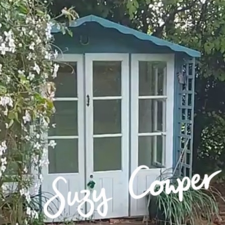 Suzy Cowper in the TeaCosyFolk summerhouse starting the spring spruce, showing the space after winter and preparing it for summertime knitting vlogs