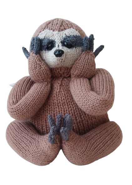 Three‑toed sloth tea cosy with neatly knitted i‑cord claws shown clearly at the front of the cosy